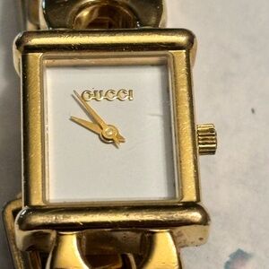 Gucci Women's Gold and White Watch